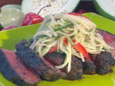 Cooking Channel serves up this Jerk Rubbed Rib-Eye with Green Papaya Relish recipe from Bobby Flay plus many other recipes at CookingChannelTV.com