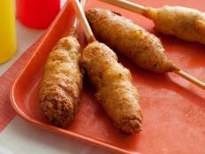 Cooking Channel serves up this Corn Dogs recipe from Alton Brown plus many other recipes at CookingChannelTV.com
