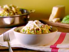 Cooking Channel serves up this Tagliatelle with Smashed Peas, Sausage, and Ricotta Cheese recipe  plus many other recipes at CookingChannelTV.com