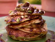 Cooking Channel serves up this Orange Ricotta Pancakes with Caramelized Fig and Pistachio Compote recipe from Bobby Flay plus many other recipes at CookingChannelTV.com