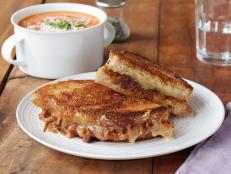 Cooking Channel serves up this Grilled Cheese with Caramelized Onions recipe from Chuck Hughes plus many other recipes at CookingChannelTV.com