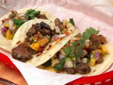 Cooking Channel serves up this Crispy Fragrant Duck Tacos with Asian Pear and Mango Salsa recipe from Ching-He Huang plus many other recipes at CookingChannelTV.com