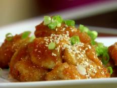 Cooking Channel serves up this Sweet 'n Sticky Sesame Chicken recipe  plus many other recipes at CookingChannelTV.com
