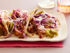 Cooking Channel serves up this Braised Pork Tacos recipe from Rachael Ray plus many other recipes at CookingChannelTV.com