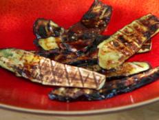 Cooking Channel serves up this Grilled Eggplant with Garlic Sauce and Mint recipe from Bobby Flay plus many other recipes at CookingChannelTV.com