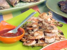 Cooking Channel serves up this Grilled Shrimp with Asian Style "Cocktail" Sauce recipe from Bobby Flay plus many other recipes at CookingChannelTV.com