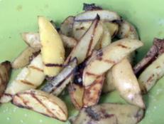 Cooking Channel serves up this Vinegar and Salt Grilled Potato "Chips" recipe from Bobby Flay plus many other recipes at CookingChannelTV.com