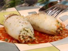 Cooking Channel serves up this Stuffed Squid: Kalamarakia Yemista recipe from Bobby Flay plus many other recipes at CookingChannelTV.com