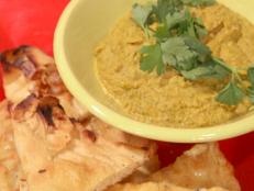 Cooking Channel serves up this Lentil and Split Pea Dip with Roasted Garlic Naan recipe from Bobby Flay plus many other recipes at CookingChannelTV.com