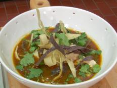 Cooking Channel serves up this Chicken-Posole Soup recipe from Bobby Flay plus many other recipes at CookingChannelTV.com