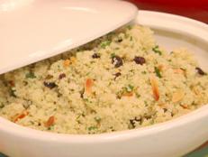 Cooking Channel serves up this Couscous with Currants, Almonds, and Parsley recipe from Bobby Flay plus many other recipes at CookingChannelTV.com