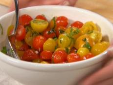 Cooking Channel serves up this Tiny Tomatoes Salad recipe from Brigitte Nguyen plus many other recipes at CookingChannelTV.com