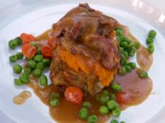 Cooking Channel serves up this Hot Turkey Dinner: Heritage Turkey Leg Confit with Maple Whipped Sweet Potatoes, Baby Carrots and Sweet Peas recipe from Lynn Crawford plus many other recipes at CookingChannelTV.com