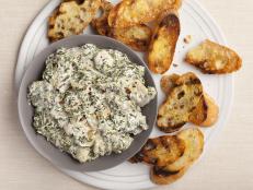 Cooking Channel serves up this Hot Spinach and Artichoke Dip recipe from Alton Brown plus many other recipes at CookingChannelTV.com