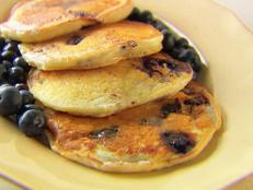 Cooking Channel serves up this Ricotta Pancakes recipe from Giada De Laurentiis plus many other recipes at CookingChannelTV.com
