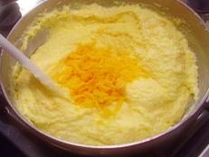 Cooking Channel serves up this Cheese Grits recipe from Alton Brown plus many other recipes at CookingChannelTV.com
