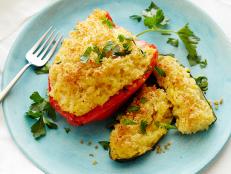 Cooking Channel serves up this Risotto Stuffed Peppers and Zucchini recipe from Rachael Ray plus many other recipes at CookingChannelTV.com
