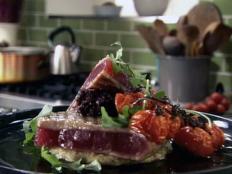 Cooking Channel serves up this Grilled Tuna with White Bean Puree, Olive Tapenade and Roasted Cherry Tomatoes recipe from Tyler Florence plus many other recipes at CookingChannelTV.com