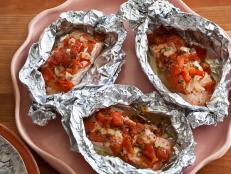Cooking Channel serves up this Salmon Baked in Foil recipe from Giada De Laurentiis plus many other recipes at CookingChannelTV.com