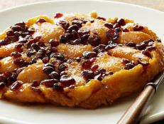 Cooking Channel serves up this Upside-Down Pear Cranberry Tart recipe  plus many other recipes at CookingChannelTV.com