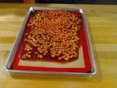 Cooking Channel serves up this Peanut Brittle recipe from Alton Brown plus many other recipes at CookingChannelTV.com