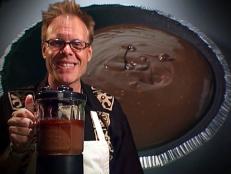 Cooking Channel serves up this Moo-Less Chocolate Pie recipe from Alton Brown plus many other recipes at CookingChannelTV.com