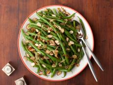 Cooking Channel serves up this Green Beans with Caramelized Onions and Almonds recipe from Tyler Florence plus many other recipes at CookingChannelTV.com