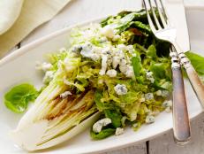 Cooking Channel serves up this Grilled Romaine Salad with Blue Cheese recipe from Alexandra Guarnaschelli plus many other recipes at CookingChannelTV.com