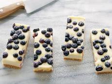 Cooking Channel serves up this Lemon Blueberry Cheesecake Bars recipe from Tyler Florence plus many other recipes at CookingChannelTV.com