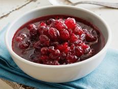 Cooking Channel serves up this Cranberry Sauce with Bourbon and Vanilla Bean and Orange recipe from Michael Symon plus many other recipes at CookingChannelTV.com