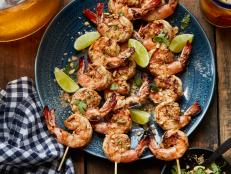 Seafood belongs on your grill: These shrimp kebabs get a tropical citrusy kick from the marinade, and a fresh and crunchy finish from the toasted coconut, cilantro and peanut topping.