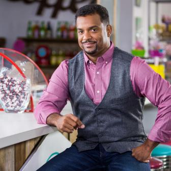 Host Alfonso Ribeiro poses for a portrait, as seen on Food Network's Unwrapped 2.0, Season 1.