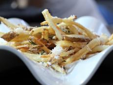 Cooking Channel serves up this Duck Fat Fries with Rosemary and Parm with Greek Yogurt Aioli recipe from Michael Symon plus many other recipes at CookingChannelTV.com