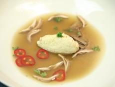 Cooking Channel serves up this Brodo with Pacific Halibut Quenelle and Shaved Wild Mushrooms recipe from Michael Symon plus many other recipes at CookingChannelTV.com