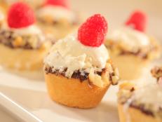 Cooking Channel serves up this Mini Ice Cream Cookie Cups recipe  plus many other recipes at CookingChannelTV.com