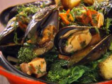 Cooking Channel serves up this Mussels with Bacon and Rapini recipe from Chuck Hughes plus many other recipes at CookingChannelTV.com