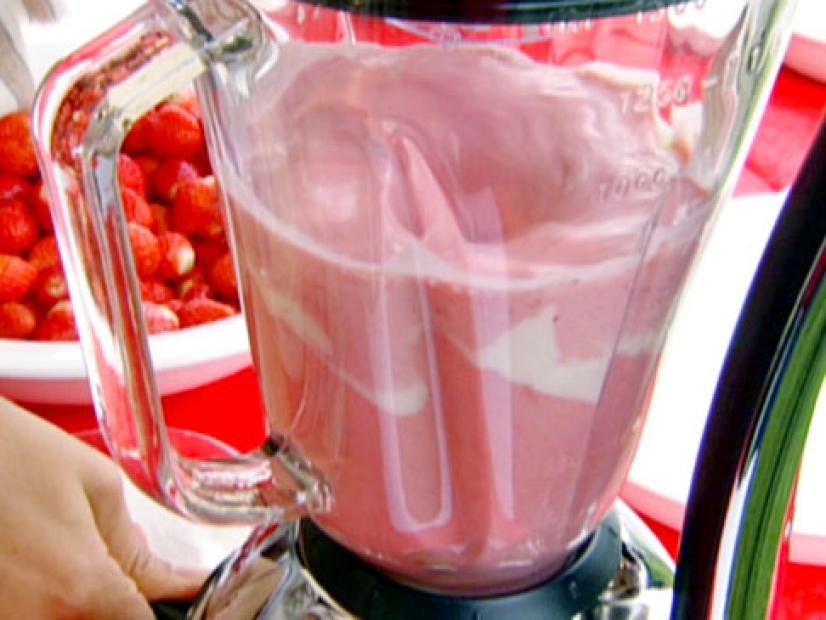 Strawberry lassi is made with strawberries and yogurt.