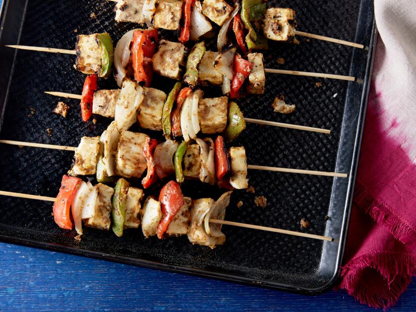 Paneer and vegetable skewers is made with paneer, green capsicum pepper, and red capsicum pepper.,Anjum Anand's Paneer and Vegetable Skewers for Apetizers, Sides, Dips as seen on Cooking Channel