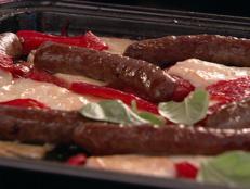 Cooking Channel serves up this Merguez with Halloumi and Flame-Roasted Peppers recipe  plus many other recipes at CookingChannelTV.com