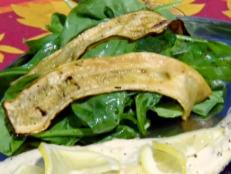 Cooking Channel serves up this Grilled Zucchini over Baby Spinach recipe  plus many other recipes at CookingChannelTV.com