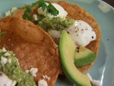 Cooking Channel serves up this Huevos Rancheros with Tomatillo Salsa recipe from Aida Mollenkamp plus many other recipes at CookingChannelTV.com