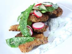Cooking Channel serves up this Milanese Lamb Blade Chops with Tzatziki and Radish Salad recipe from Michael Symon plus many other recipes at CookingChannelTV.com