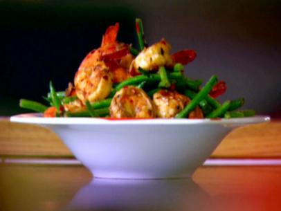 Zesty chile tiger prawns with French beans.