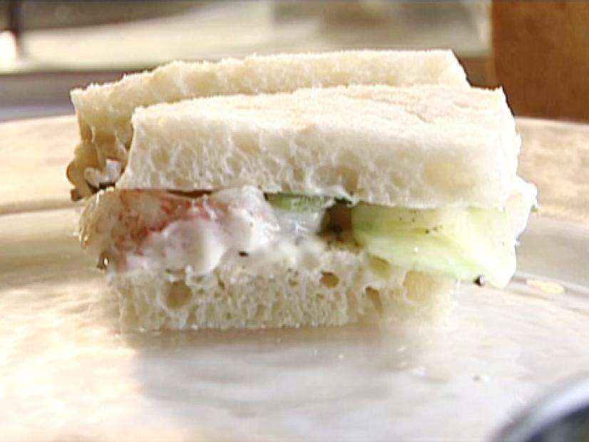 Small sandwiches of lobster with lime mayonnaise and thinly sliced cucumber.