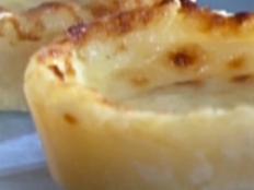 Cooking Channel serves up this Portuguese Custard Tarts recipe from Bill Granger plus many other recipes at CookingChannelTV.com