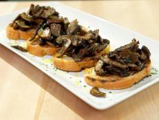 Cooking Channel serves up this Bruschetta with Sauteed Mushrooms recipe from Debi Mazar and Gabriele Corcos plus many other recipes at CookingChannelTV.com