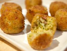 Cooking Channel serves up this Risotto Croquettes: Arancini Di Riso recipe from Debi Mazar and Gabriele Corcos plus many other recipes at CookingChannelTV.com