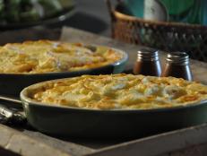Cooking Channel serves up this Fisherman's Pie with Potato Gratin recipe from Roger Mooking plus many other recipes at CookingChannelTV.com