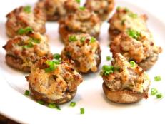 Cooking Channel serves up this Sausage Stuffed Mushrooms recipe from Kelsey Nixon plus many other recipes at CookingChannelTV.com