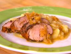 Cooking Channel serves up this Spice-Rubbed Pork Tenderloin with Celery Root-Apple Puree and Cider Gravy recipe  plus many other recipes at CookingChannelTV.com